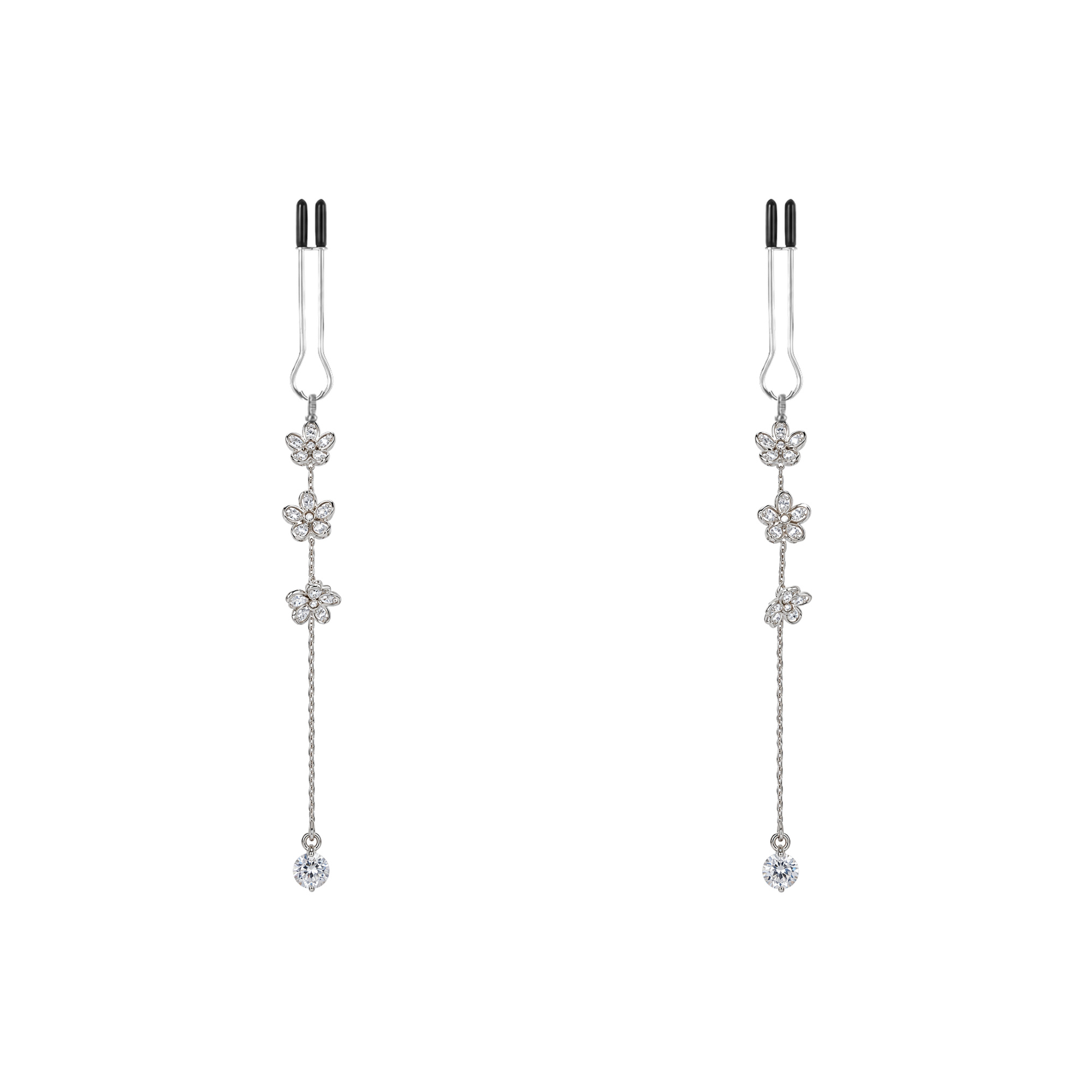 A pair of silver-tone non-piercing clips: small floral motifs along a fine dangling strand