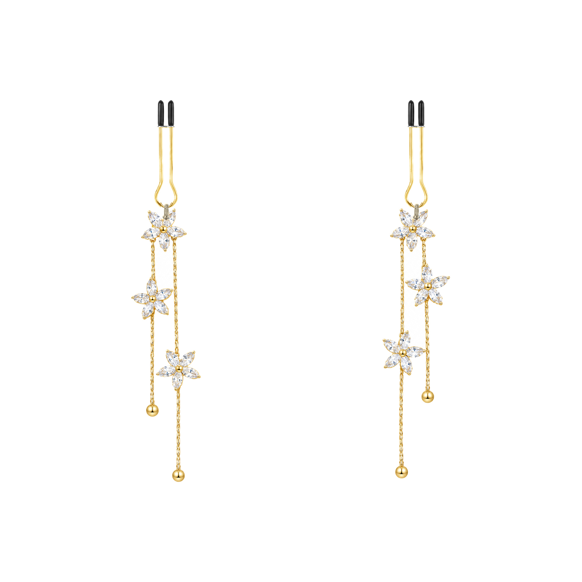 A pair of gold-tone non-piercing clips: four-point motifs along fine strands