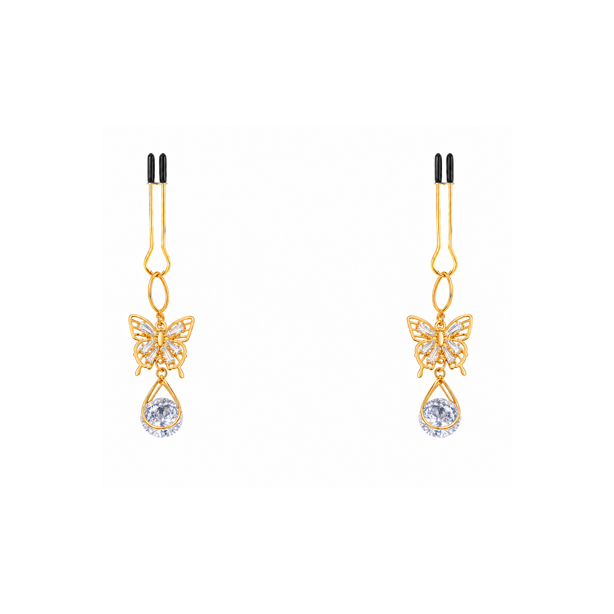 A pair of gold-tone non-piercing clips: butterfly motif and a clear drop-shaped accent
